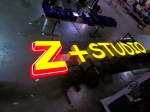 Z+Studio face-lit channel letters with neon border and backplate by Signs Manufacturing