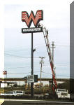 Servicing 80' tall Whataburger Sign in Red Oak, Texas
