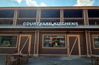 Courtyard Kitchens Individual lighted channel letter sign on a raceway for Dallas TX