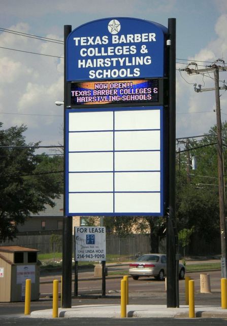 Professional sign crew installing a manufactured LED sign in Dallas